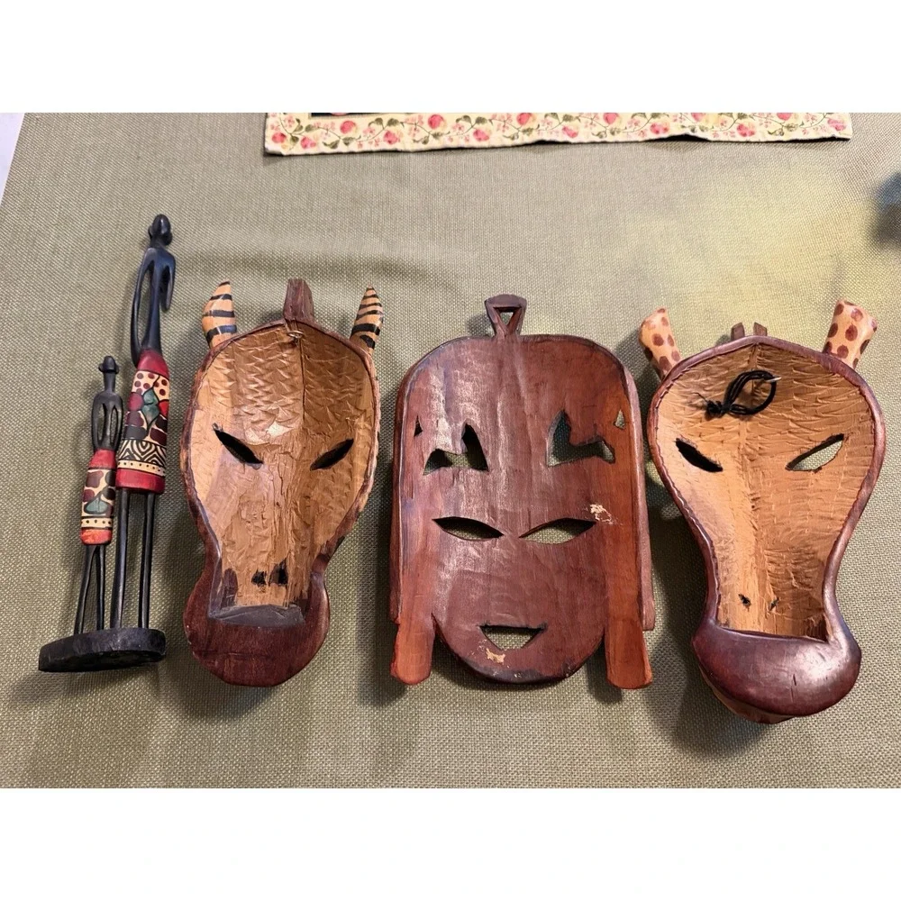 hand carved wooden African Masks Plus Statue Lot Of 4 Pieces Animal And Head